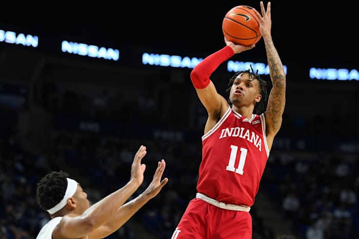 Indiana Hoosiers guard CJ Gunn (11) shoots the ball as Penn State Nittany Lions guard Jalen Pickett (left) defends during the second half at the Bryce Jordan Center.